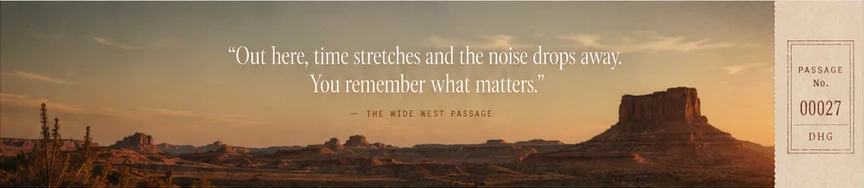 The Wide West passage over a sunset desert butte.